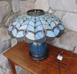 A Decorative Acrylic Stained Glass Lamp With Pottery Base