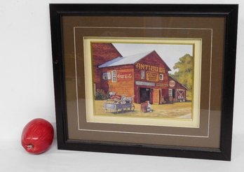 A Framed Print Of An Antique Shop On An Old Barn With Lots Of Advertising