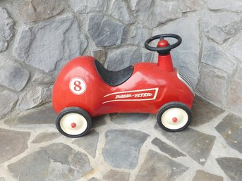 A Radio Flyer No. 8 Toddlers Race Car With Beep-Beep Horn