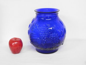 A Cobalt Blue Decorative Glass Vase With Fruits