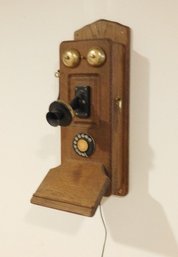 An Old Oak Wall Mount Rotary Dial Telephone