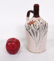 An Art Pottery Floral Decorated Jug