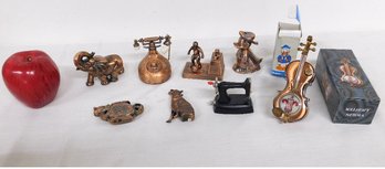 A Table Lot Of Figural Butane Lighters, Telephone, Elephant, Sports Player, Sewing Machine, Howling Wolf, Etc.