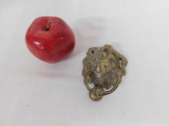 A Bronzed Lions Head Figural Door Knocker