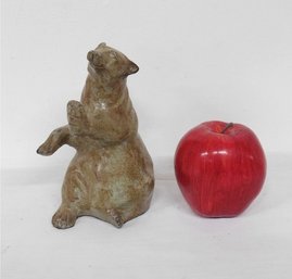 A Carved And Polished Stone Bear Figure