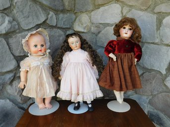 Three Larger Dolls On Stands