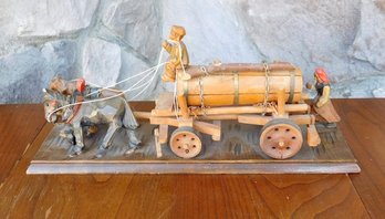 A Folk Art Carving Of Mules Pulling A Water Or Milk Wagon With Farmer Driver & Wife Walking Behind