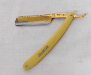 A Really Nice Solingen Germany Gold Trimmed Straight Razor With Celluloid Handle