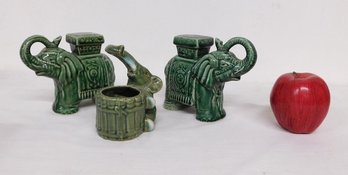 A Trio Of Figural Ceramic Green Elephants