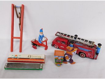 A Small Group Of Tin Toys, Harmonica & Wooden Monkey Acrobat Toy