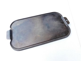 A Cast Iron Wagner Ware Griddle