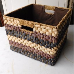 A Woven Lined Metal Countertop Basket For Towels, Washcloths, Hair Care Items, Etc...