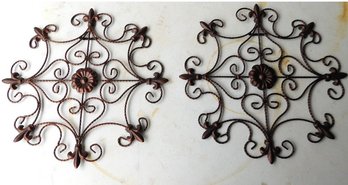 A Pair Of Coppery French Fleur De' Lis Wall Accessories