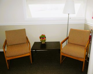 Mid Century Waiting Area Seating, Table With Flowers And Floor Lamp