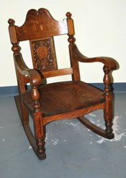 Antique Oak Rocking Chair With Hand Carved Decoration On Back