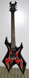 B.C. Rich Warlock Black/red Electric Guitar With Tribal Decor.