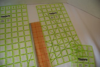 Set Of 3 Omnigrip Green Rulers And One Orange Metal Edge Ruler For Quilting And Sewing