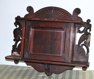 Antique Hanging Cabinet With Griffens.