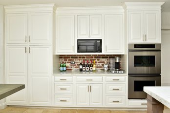 Quality Custom Wood Lower And Upper Kitchen Cabinets With Carrera Marble Counter Top