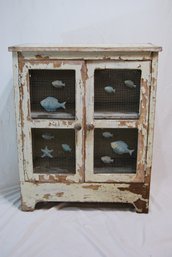 Vintage Distressed Cabinet With Fish Decorations