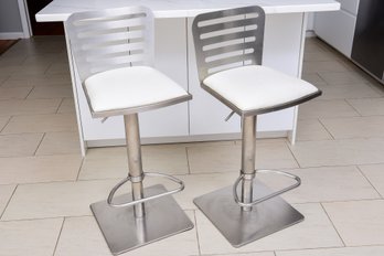 A Pair Of Armen Living Delmar Adjustable Brushed Stainless Steel Barstools, White