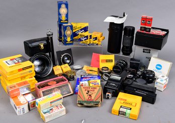 Large Collection Of Camera Lenses, Accessories, And More
