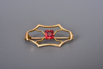 Sweet 10K Yellow Gold Pin With Red Glass Stone