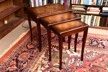 Set Of Three Mahogany Nesting Tables With Tooled Leather Tops