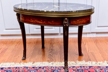 Antique French Inlaid Oval Cocktail Tea Table With Marble Top, Bronze Gallery Mountings And Paw Feet