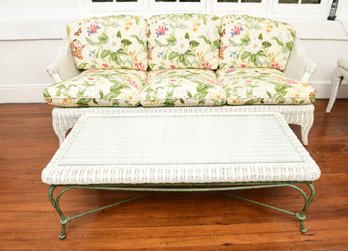 Wicker Three Cushion Sofa And Matching Cocktail Table With Glass Top And Iron Base