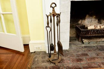 Four Piece Brass Fireplace Tool Set With Stand