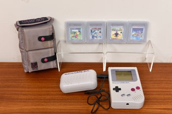 Vintage Nintendo Game Boy System With Five Games In Carrying Pouch