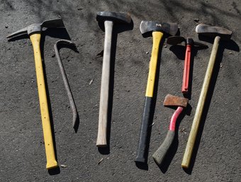 Lot Of Various Hand Tools Including Crowbar, Three Axes, Pick Axe And Gardening Pick