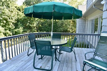 Outdoor Dining Table With Umbrella And Four Matching Mesh Arm Chairs