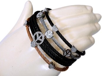 Collection Of Five Sterling Silver And Steel Cable Bracelets With Diamond Chips