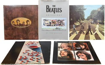 Collection Of Four Beatles Vinyl Records And The Beatles First Edition Anthology Hardcover Book