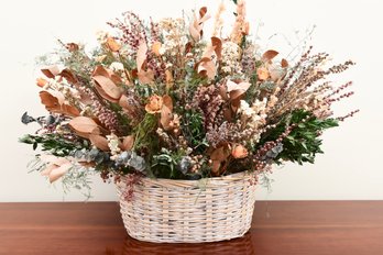 Dried Floral Arrangement In A Wicker Basket