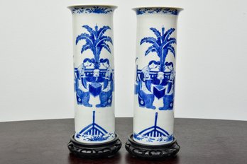 Pair Of Chinese Blue And White Cylindrical Vases With Flared Rims And Stands