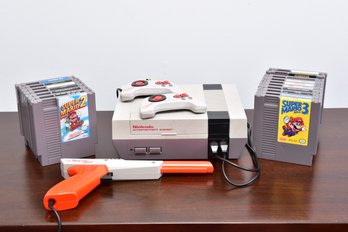 Nintendo NES Game System With 17 Games, Controllers And Duck Hunt Game Gun