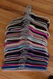 Collection Of 100 Velvet Hangers In Assorted Colors (5 Of 10)