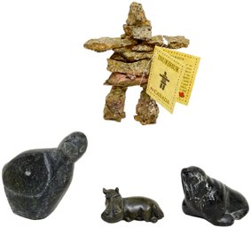 Collection Of Inuit Soapstone Sculptures And Inukshuk Stone Figurine