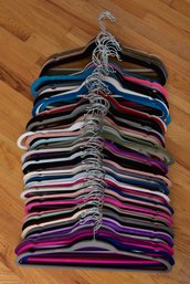 Collection Of 100 Velvet Hangers In Assorted Colors (8 Of 10)