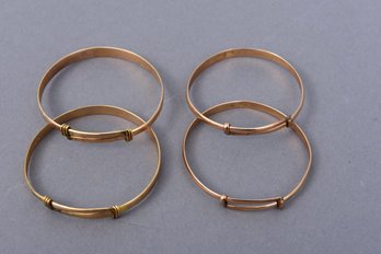 Set Of Four 18K C.T.F. Yellow Gold Child's Bangle Bracelets