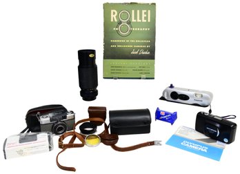 Collection Of Cameras And Accessories