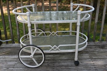 Vintage Wrought Iron Outdoor Cocktail Table With Top And Bottom Glass Shelves On Wheels