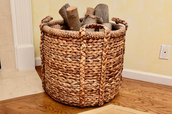 Freeman Oversized Waterhyacinth Basket With Plaited Handles And Logs Of Wood
