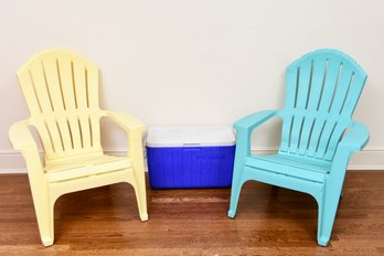 Pair Of Stacking Yellow And Blue Plastic Adirondack Chairs And Coleman 48 Qt Cooler