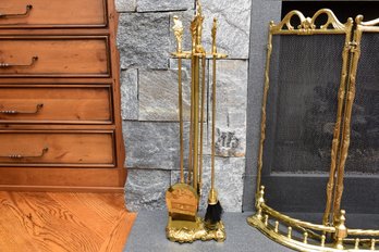 Fancy Brass Four Piece Fireplace Tool Set With Stand