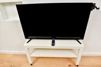 TCL 42' Television With Remote And Stand On Casters