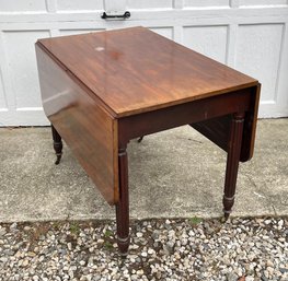 Antique Mahogany Drop Leaf Dining Table On Casters